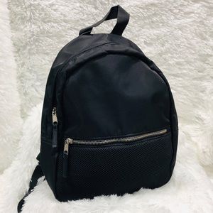 Small, Black Backpack.